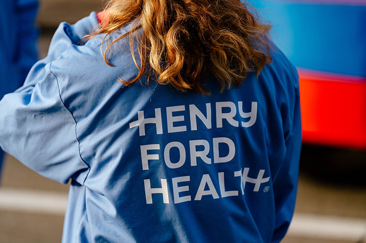 Nurse with logo jacket