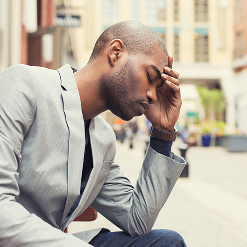 man with headache stroke symptom