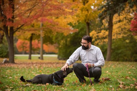 lung cancer patient shaun playing with dog