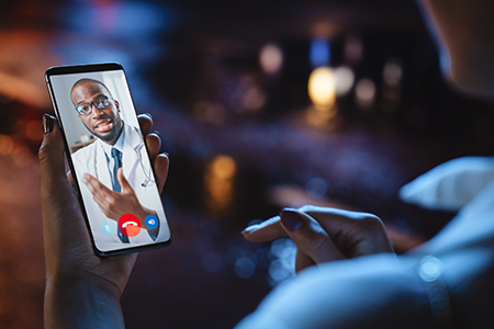 Doctor virtual visit on laptop