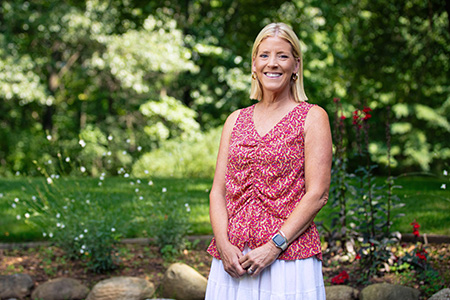 Atrial fibrillation patient Karen posed outdoors