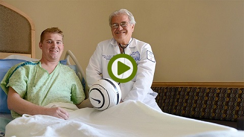 soccer coach patient with doctor