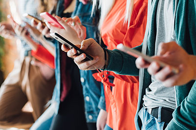 people on their phones