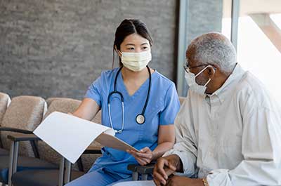 doctor talking to patient