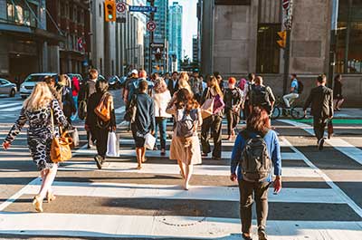 people walking on city street