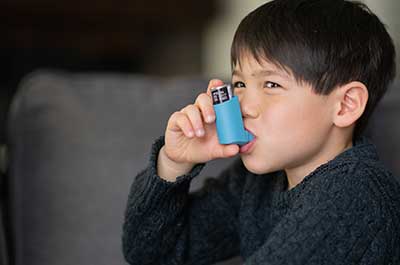 child using inhaler