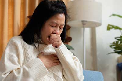 woman coughing
