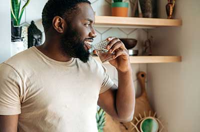 man drinking water