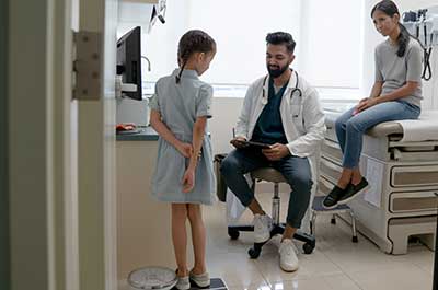 girl at pediatrician appointment