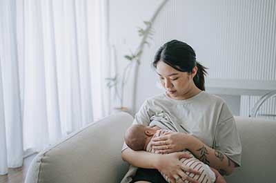 mother breastfeeding baby