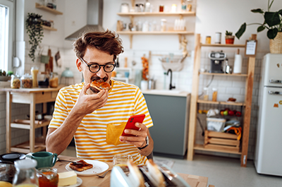 man eating toast