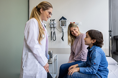 child and parent at doctor office