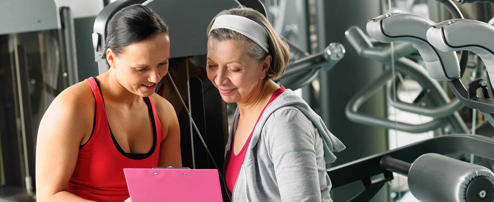 woman talking to trainer