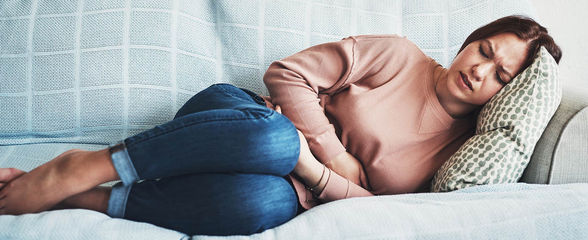 woman with stomach pains