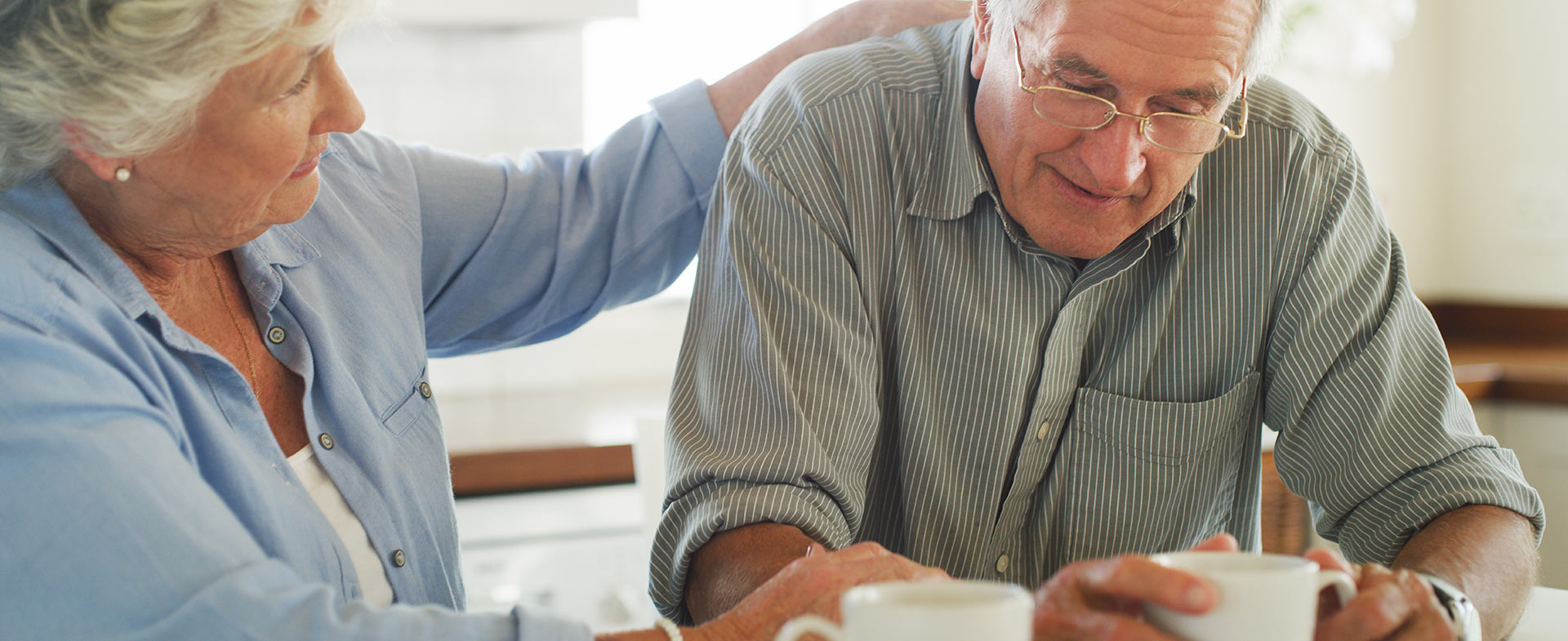 wife comforting husband