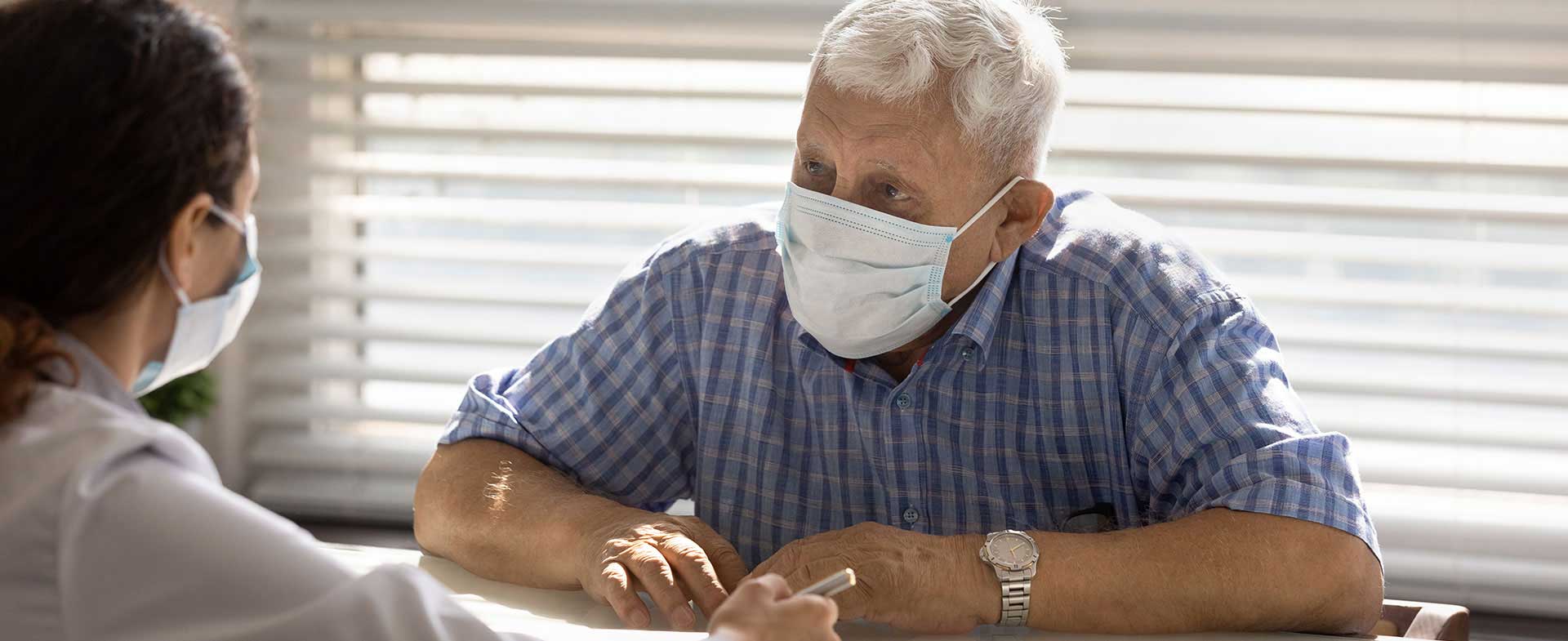 patient talking to doctor