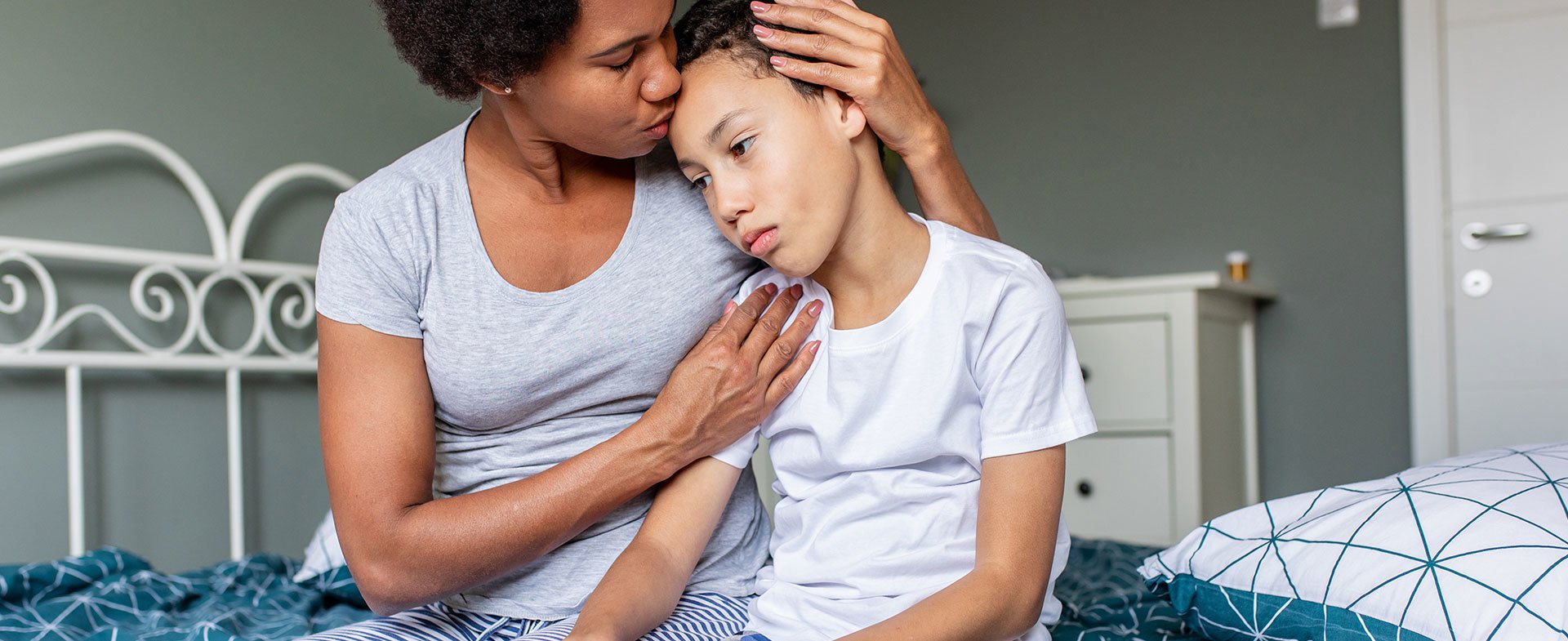 mother comforting child