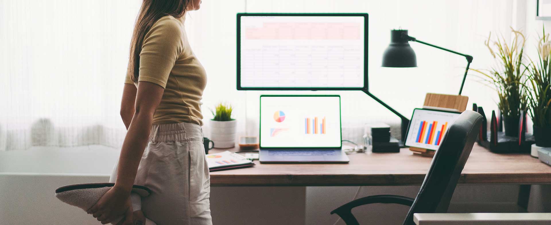 woman stretching at desk