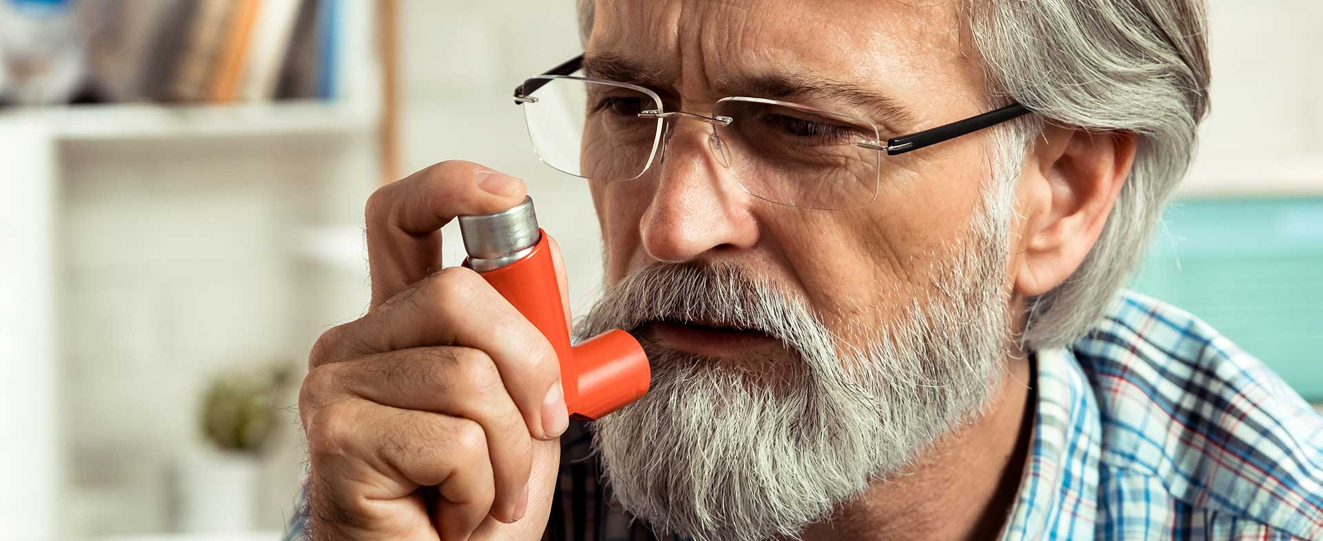 man using inhaler