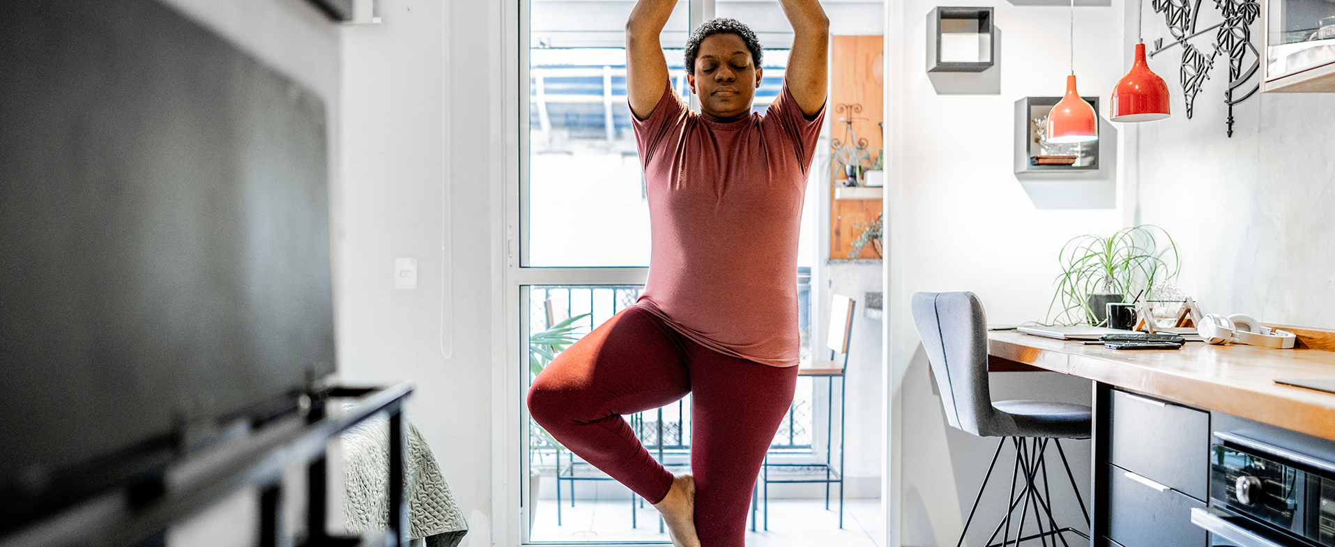 woman stretching at home