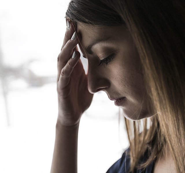 young woman looking sad