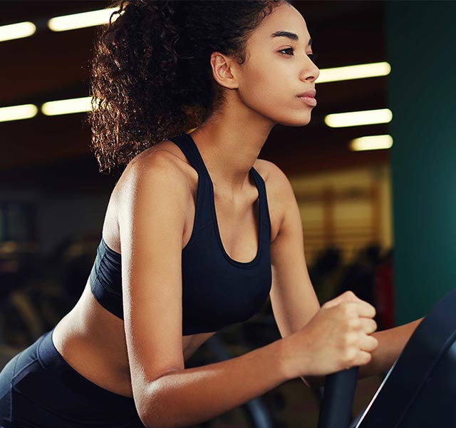 women on spinning bike