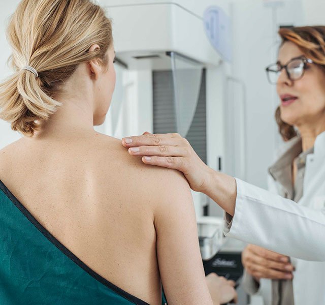 woman getting a mammogram