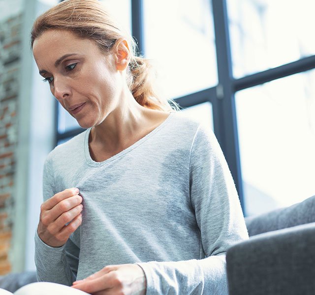 middle aged woman sitting