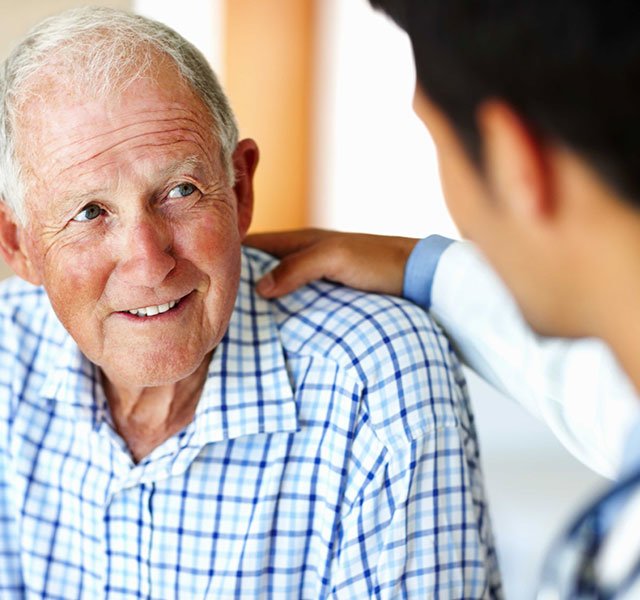older man with doctor