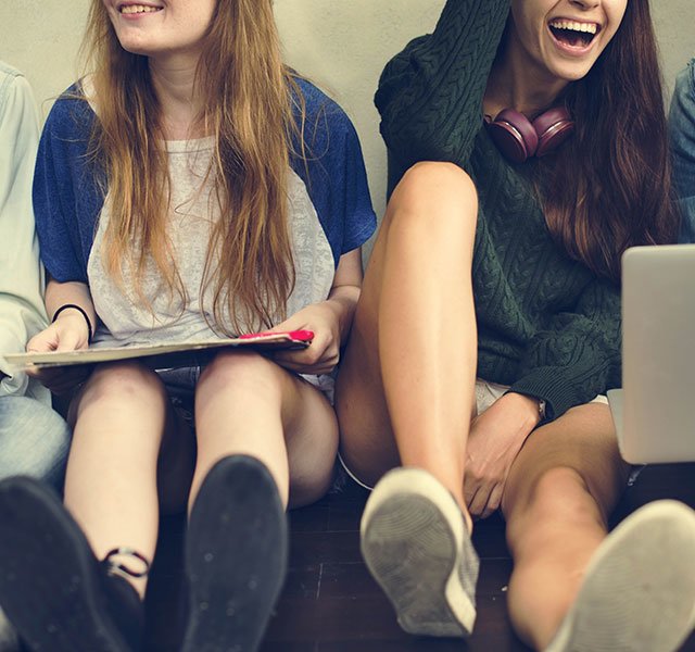 group of teenagers sitting together