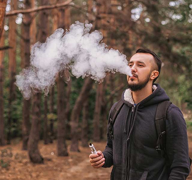 young man vaping