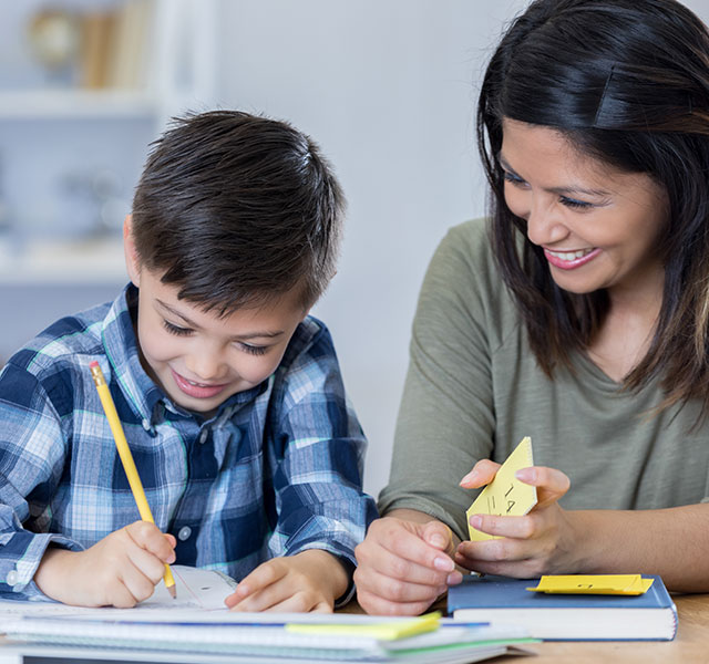 mom helping son with homework