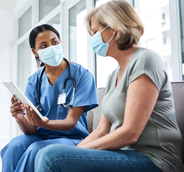 doctor talking to patient