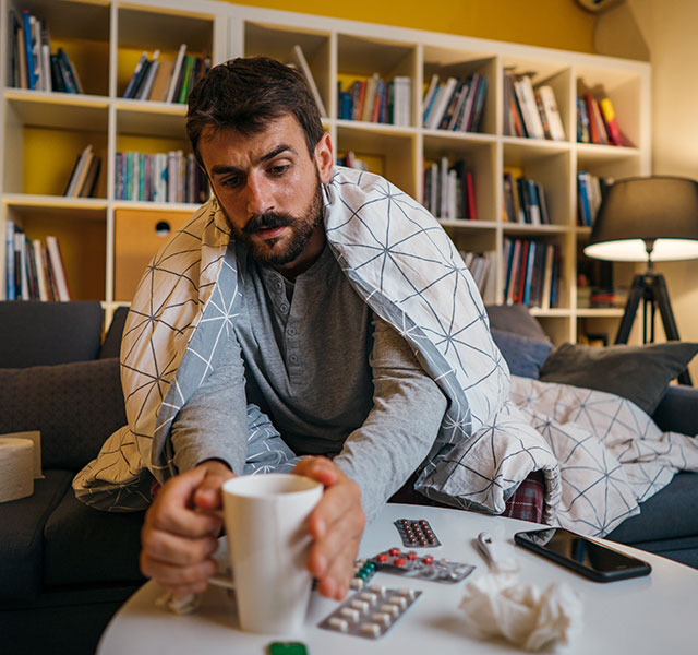 man sick at home
