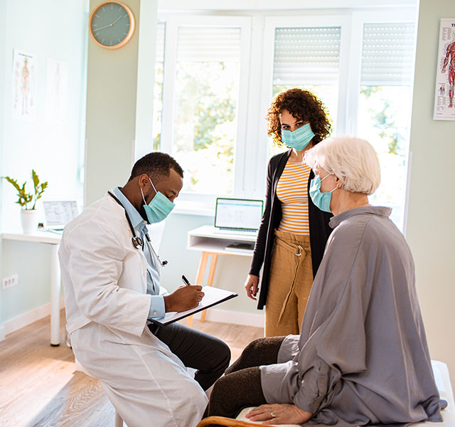 patient and family talking to doctor