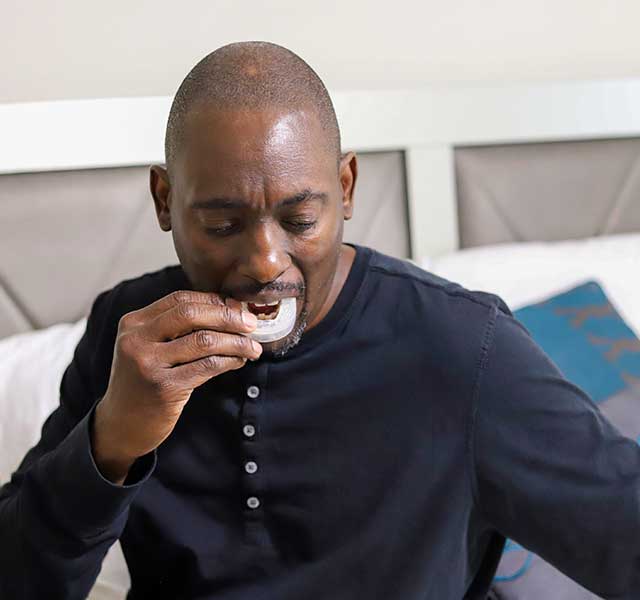 man using mouth guard