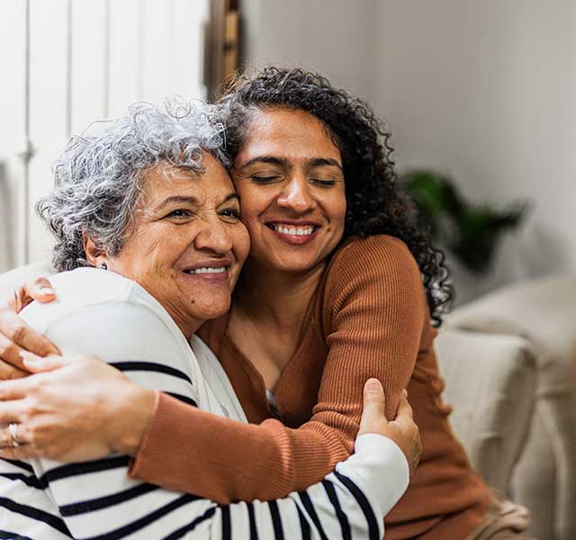mother and daughter hugging
