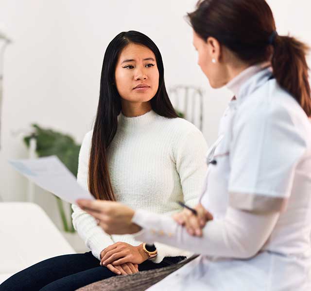 patient talking to doctor