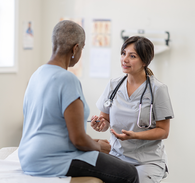 patient talking to doctor