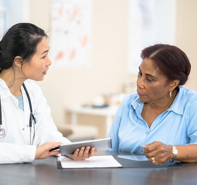 patient talking to doctor