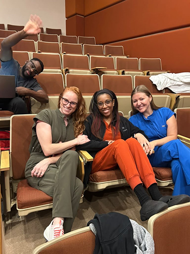 Emergency Medicine Residents in an auditorium