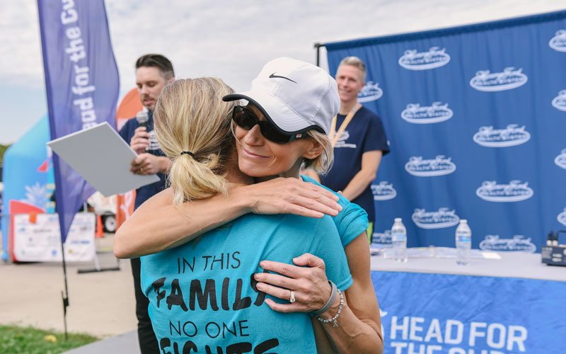 kate hugging friend at 5k