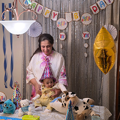 cardiology-patient-amber-holding-her-son at his birthday party