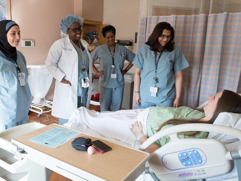 Caregiver Team labor patient with caregiver team