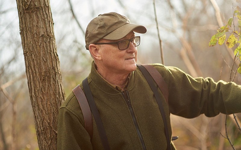 Tommy Sawdey in the woods after lymphoma treatment