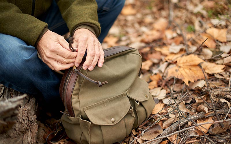 Tommy Sawdey packing his gear after lymphoma treatment