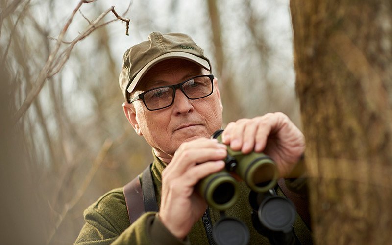 Tommy Sawdey walking in the woods after lymphoma treatment