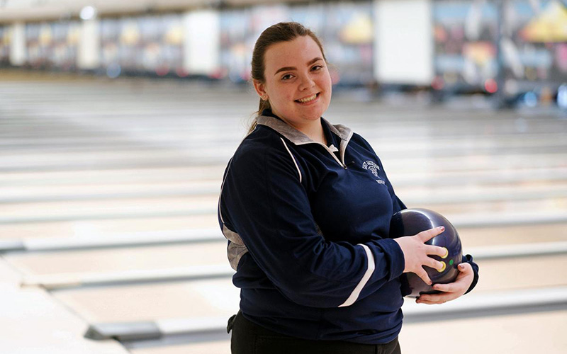 Lailah maull posing with bowling ball