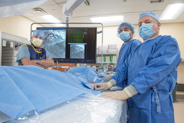 Henry Ford Health physicians pose at a catheterization lab