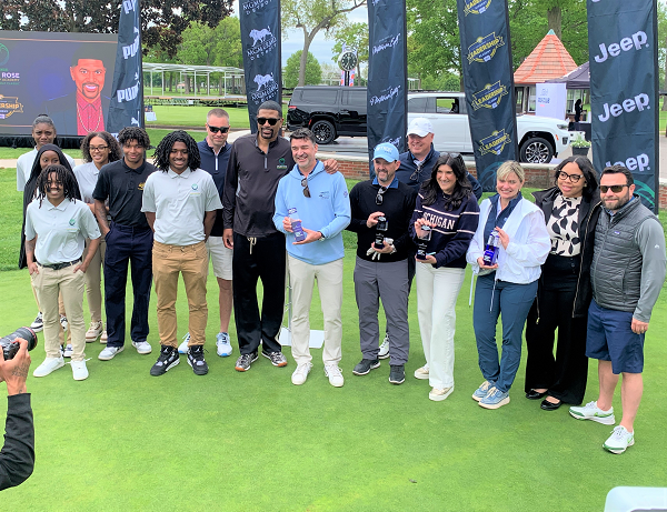Henry Ford Health team members with Jalen Rose and students from the Jalen Rose Leadership Academy.